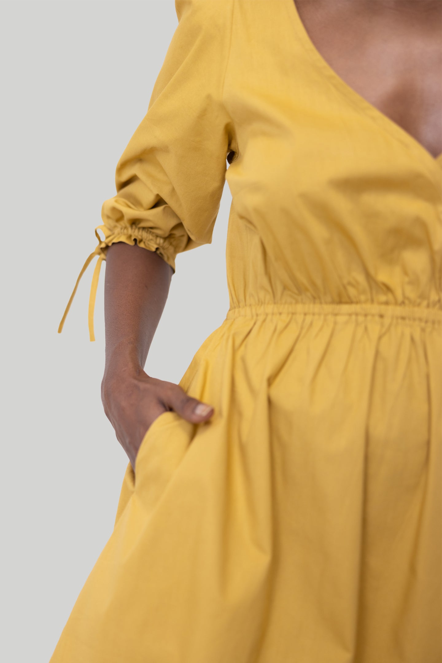 Feminine Short Dress in Mustard with Gathered Elbow Sleeve